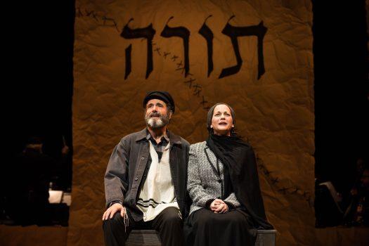 Tevye (Steven Skybell) and his wife Golde (Jennifer Babiak) in the wonderful Yiddish production of "Fiddler on the Roof." (Matthew Murphy)