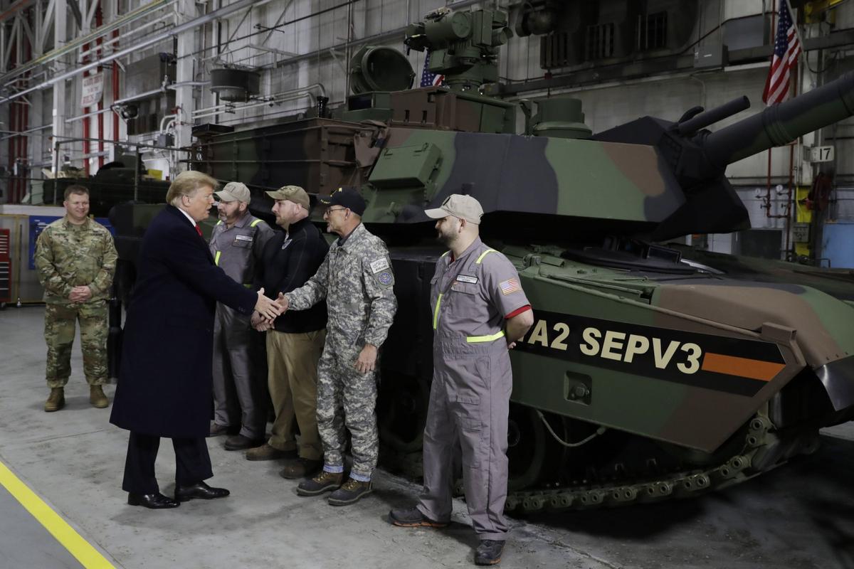 President Donald Trump arrives to deliver remarks at the Lima Army Tank Plant, in Lima, Ohio. March 20, 2019, (AP Photo/Evan Vucci)