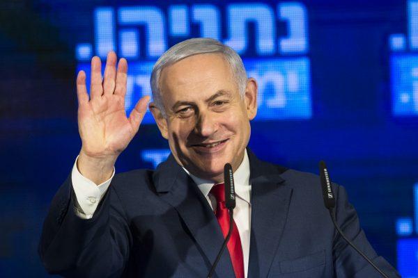 Israel's Prime Minster Benjamin Netanyahu waves to supporters after his speech during the launch of the Likud party election campaign in Ramat Gan, Israel, on March 4, 2019. (Amir Levy/Getty Images)