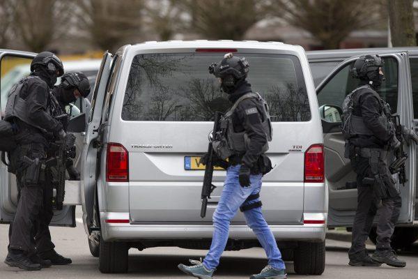 Dutch counter-terrorism police prepare to enter a house after a shooting incident in Utrecht, Netherlands, on Mar. 18, 2019. (Peter Dejong/AP Photo)