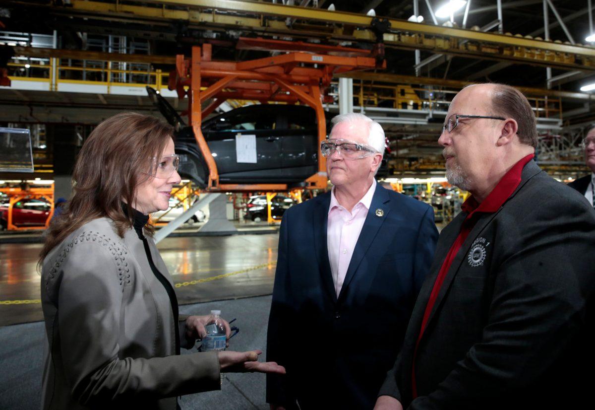 General Motors Chief Executive Officer Mary Barra (L) talks with United Auto Workers Union Vice President Terry Dittes and UAW Region 1 Director Frank Stuglin at the GM Orion Assembly Plant in Lake Orion, Mich., on March 22, 2019. (Rebecca Cook/Reuters)