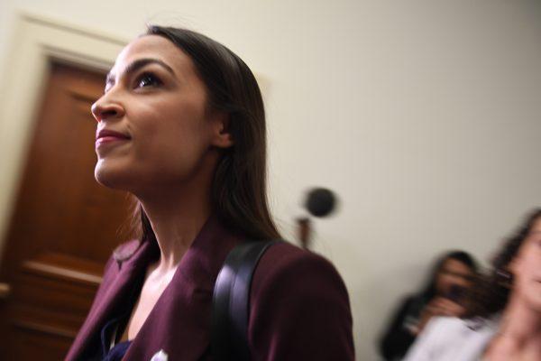 Rep. Alexandria Ocasio-Cortez (D-N.Y.) arrives to hear Michael Cohen, attorney for President Donald Trump, testify before the House Oversight and Reform Committee on Capitol Hill on February 27, 2019. (JIM WATSON/AFP/Getty Images)