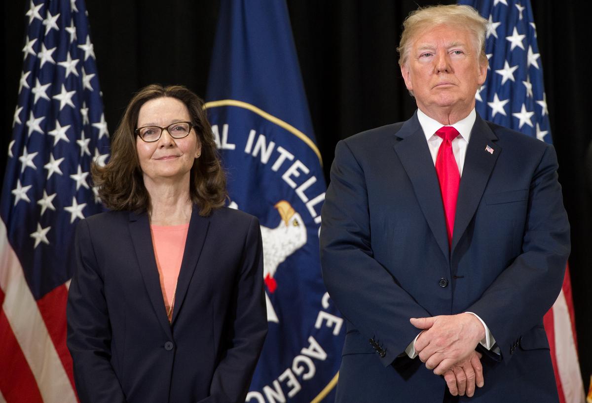 President Donald Trump stands alongside Gina Haspel before she is sworn-in as Director of the Central Intelligence Agency during a ceremony at CIA Headquarters in Langley, Virginia, May 21, 2018. (SAUL LOEB/AFP/Getty Images)