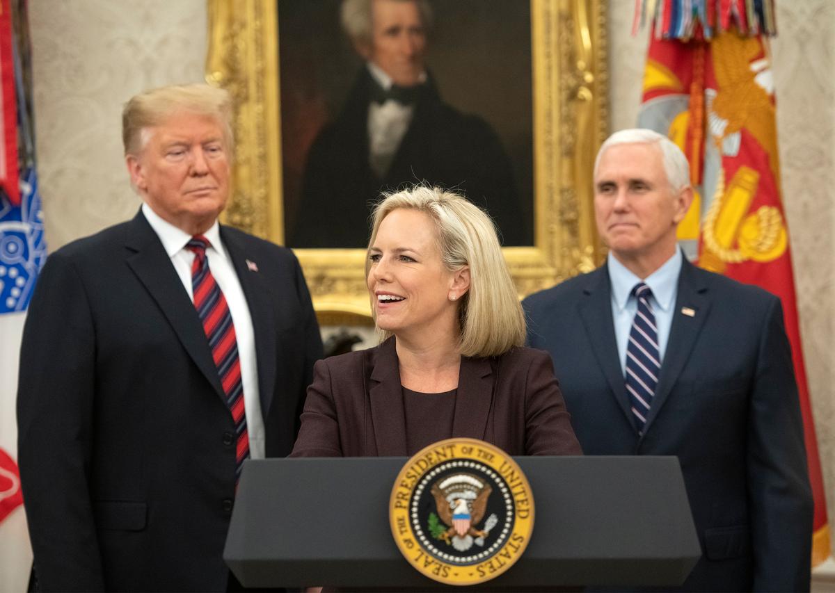 United States Secretary of Homeland Security (DHS) Kirstjen Nielsen, center, administers the oath of citizenship to five people as U.S. President Donald Trump, left, and Vice President Mike Pence in the Oval Office of the White House in Washington on Jan. 19, 2019. (Ron Sachs-Pool/Getty Images)