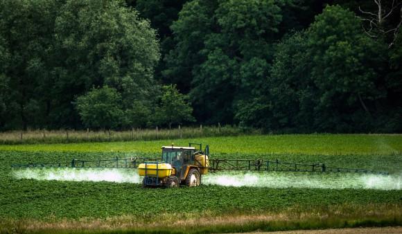 A farmer sprays pesticides on his crops in Bailleul, northern France. (Philippe Huguen/AFP/Getty Images)