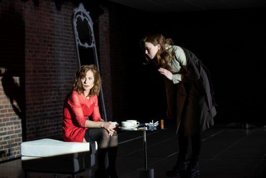 Anne (Isabelle Huppert, L) and her son’s girlfriend (Odessa Young). (Ahron R. Foster)