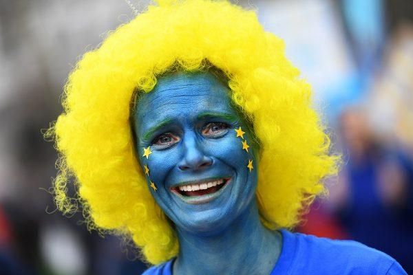 An EU supporter with her face painted, calling on the government to give Britons a vote on the final Brexit deal, participates in the 'People's Vote' march in central London, Britain, on March 23, 2019. (Dylan Martinez/Reuters)