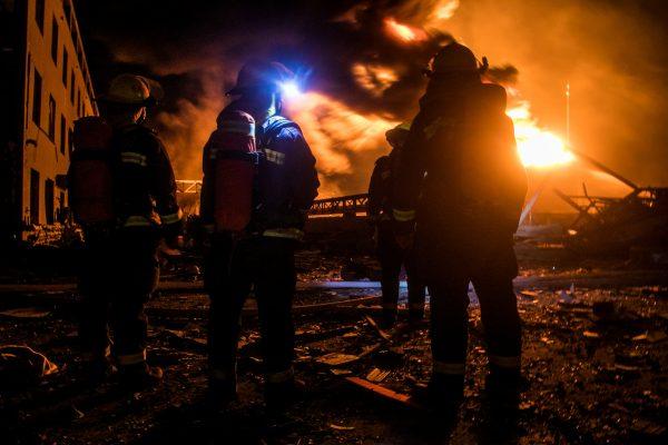 Firefighters work on extinguishing the fire following an explosion at the pesticide plant owned by Tianjiayi Chemical, in Xiangshui county, Yancheng, Jiangsu province, China on March 21, 2019. (Stringer via Reuters)