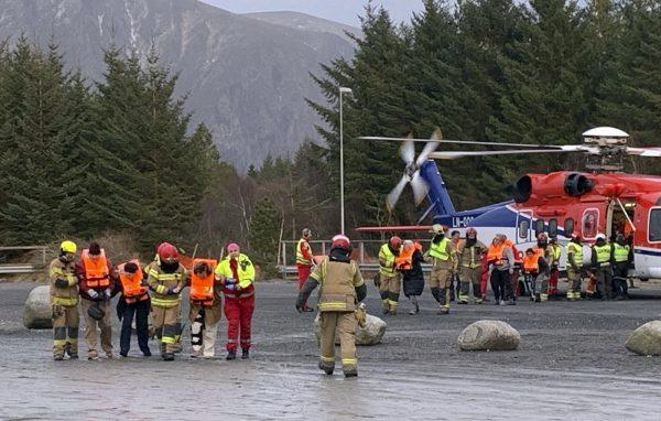 Passengers rescued from the Viking Sky cruise ship are helped from a helicopter in Hustadvika, Norway, on March 23, 2019. (Odd Roar Lange/NTB Scanpix via AP)