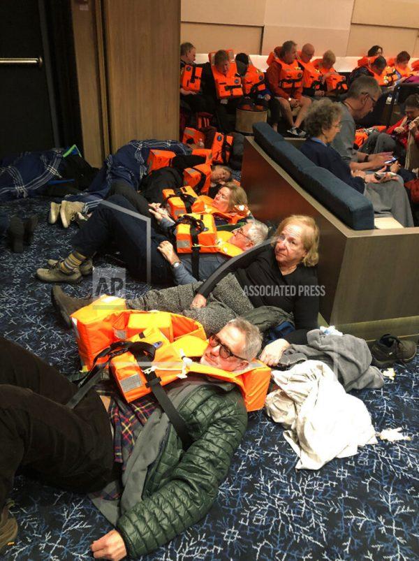 This photo provided by Alexus Sheppard shows passengers on board the Viking Sky, waiting to be evacuated, off the coast of Norway on March 23, 2019. (Alexus Sheppard via AP)