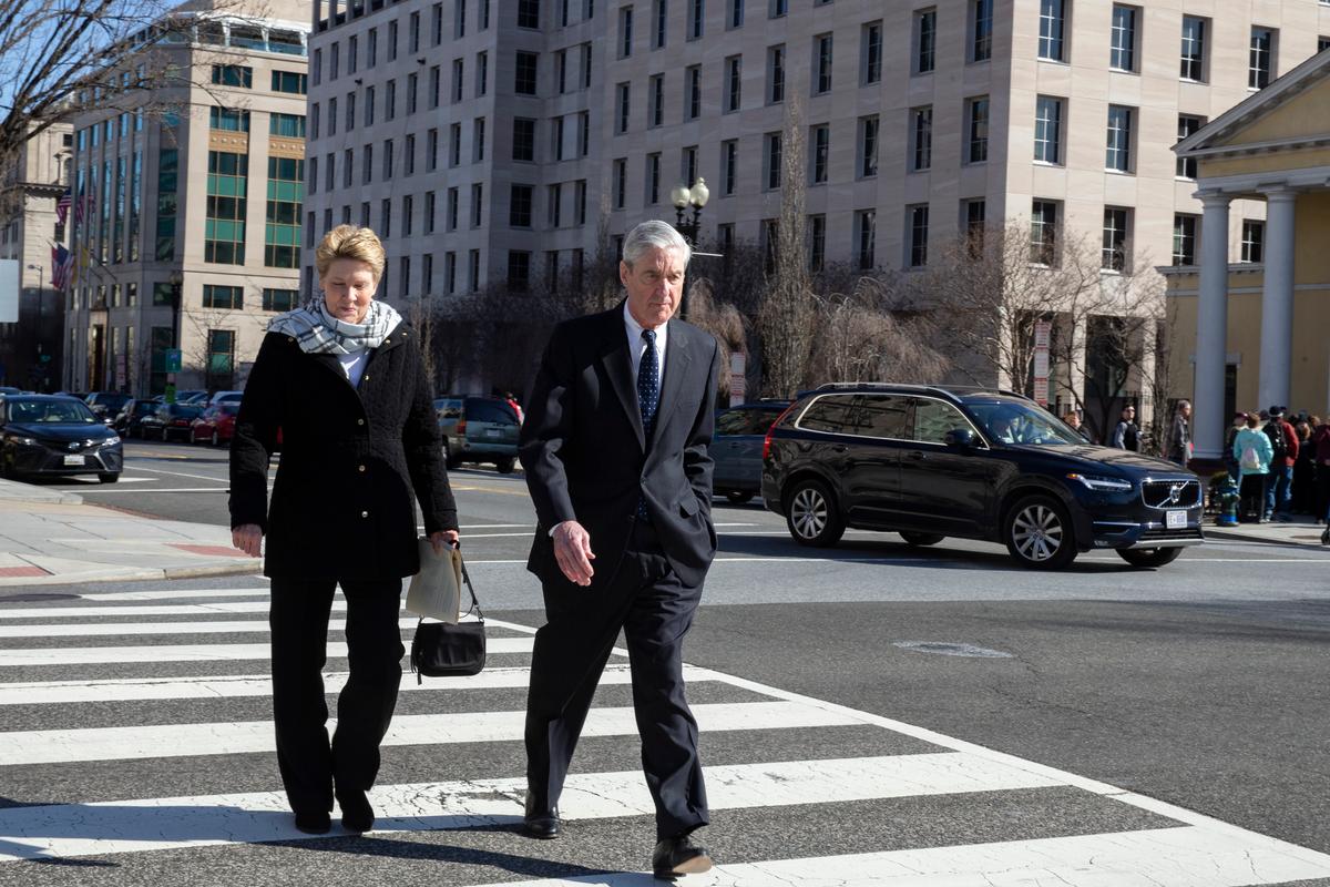 Ann Mueller and former special counsel Robert Mueller walk in Washington on March 24, 2019. (Tasos Katopodis/Getty Images)