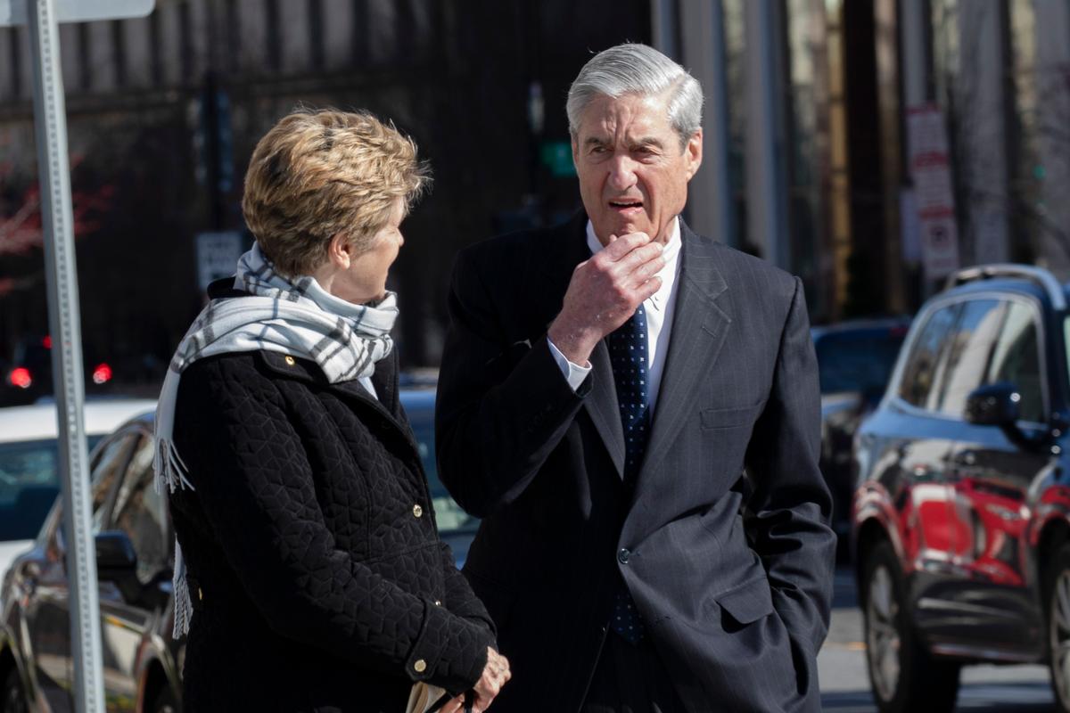 Ann Mueller and former special counsel Robert Mueller walk on March 24, 2019 in Washington. (Tasos Katopodis/Getty Images)