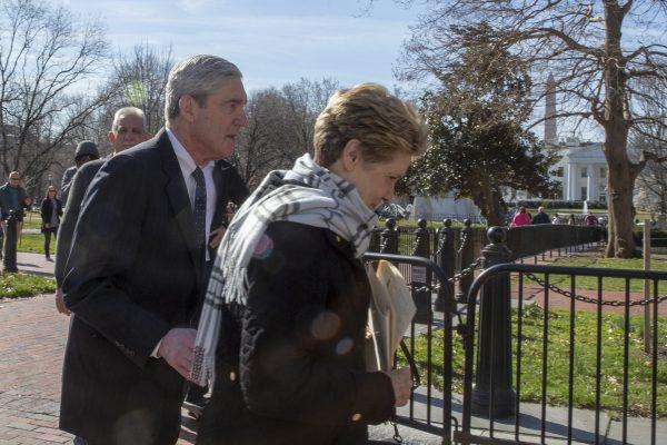 Ann Mueller and former special counsel Robert Mueller walk on March 24, 2019 in Washington. (Tasos Katopodis/Getty Images)