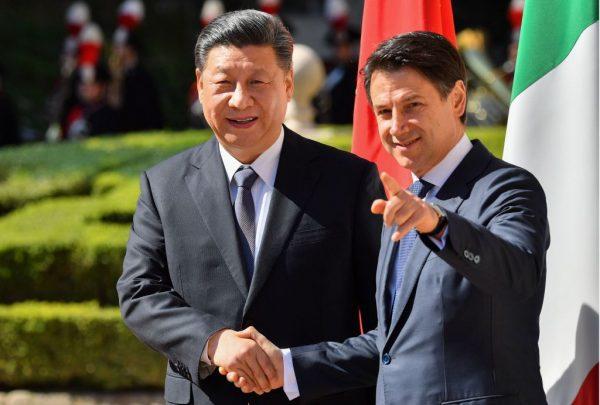 Italy's Prime Minister Giuseppe Conte (R) shakes hand with Chinese leader Xi Jinping during a welcoming ceremony in Rome on March 23, 2019. (Alberto Pizzoli/AFP/Getty Images)