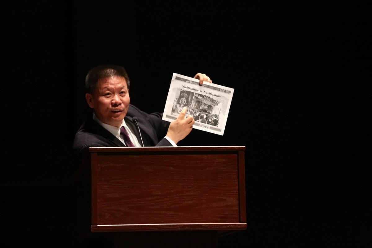 Bob Fu, president of China Aid, compares CCP's Sinification and Hitler's Nazification at the press conference to announce the Formation of The Coalition to Advance Religious Freedom in China at the Congressional Auditorium in the Capitol Visitor Center, Washington, on March 4, 2019.<br/>(Jennifer Zeng/The Epoch Times)