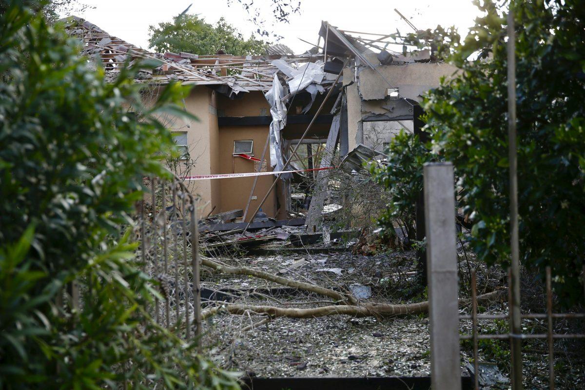 Damage to a house hit by a rocket is seen in Mishmeret, central Israel, on March 25, 2019. (Ariel Schalit/AP Photo)