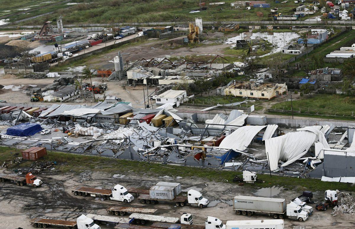 An aerial photo shows a damaged factory following the devastating Tropical Cyclone Idai in Beira, Mozambique, on March 23, 2019. (AP Photo)