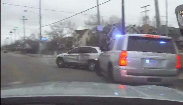 The minivan is spun round after being hit by a cruiser but recovers before continuing to flee on March 22, 2019. (Ohio State Highway Patrol)