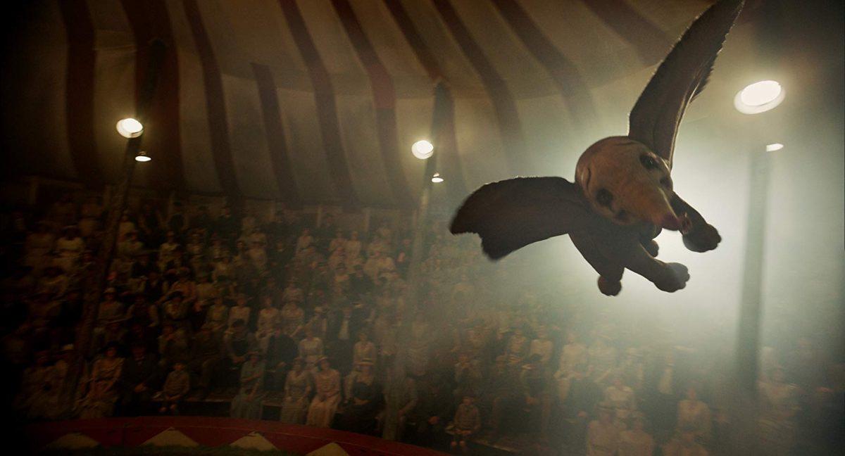 Flying baby elephant Dumbo flies around the big top, in "Dumbo." (Walt Disney Studios)