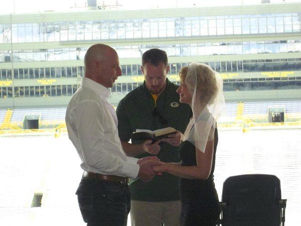 Evan and Susan Money during Wedding #16 at Lambeau Field in Green Bay, Wisconsin. (Courtesy of Evan and Susan Money)