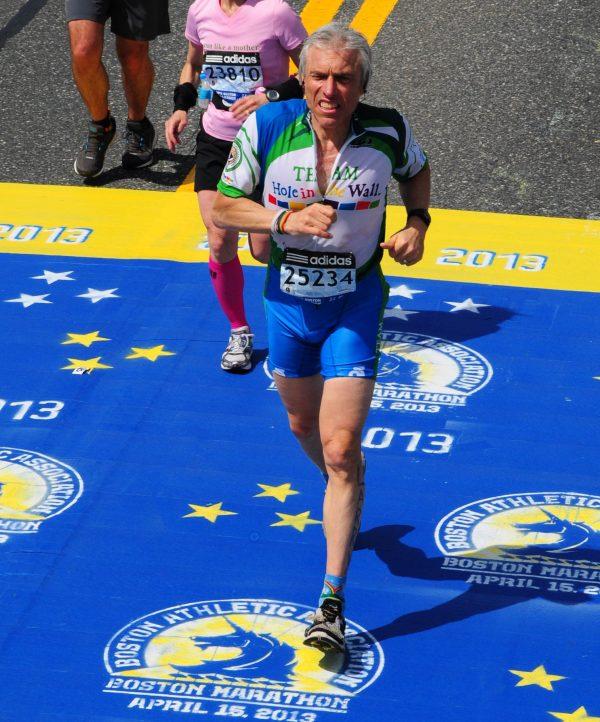 Larry Grogin running during the 2013 Boston Marathon. (Courtesy of Larry Gogin)