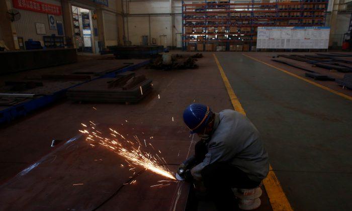 China’s Industrial Profits Shrink Most Since Late 2011 as Economy Cools