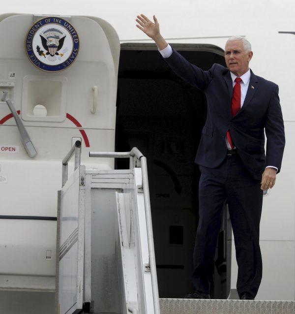 Vice President Mike Pence waves from Air Force Two as he arrives in Huntsville to chair the fifth National Space Council meeting held at the U.S. Space and Rocket Center in Huntsville, Ala., on March 26, 2019. (Eric Schultz/AP Photo)
