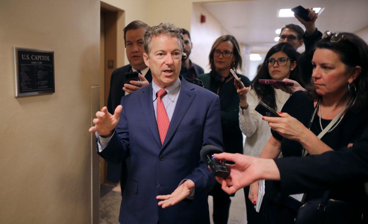 Sen. Rand Paul talks to reporters as he heads to the U.S. Capitol for the weekly Republican policy luncheon on March 5, 2019. (Chip Somodevilla/Getty Images)