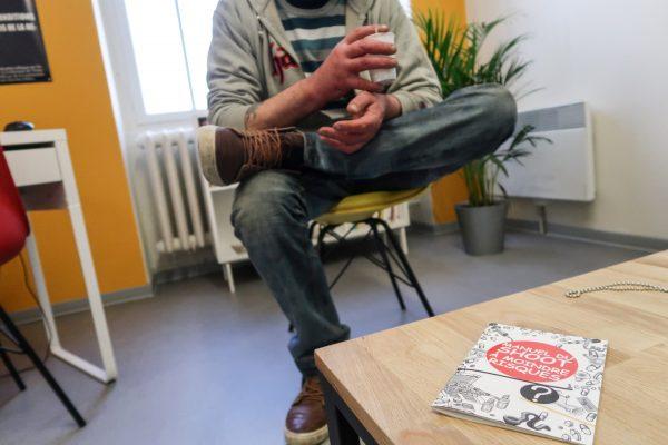 Loic, a drug user, speaks to a journalist in the ARGOS supervised injection site in Strasbourg on March 30, 2017. (Sebastien Bozon/AFP/Getty Images)