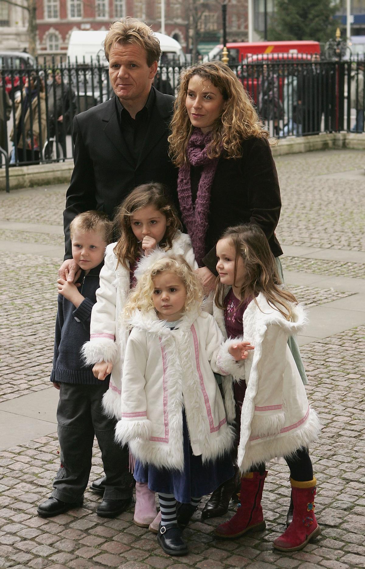 Chef Gordon Ramsay and family arrives at the Woman's Own Children Of Courage Award at Westminster Abbey on Dec. 15, 2004, in London. (©Getty Images | <a href="https://www.gettyimages.ca/detail/news-photo/chef-gordon-ramsay-and-family-arrives-at-the-womans-own-news-photo/51861955">MJ Kim</a>)