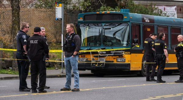 The driver of a Metro Bus has been hailed a hero for driving passengers to safety despite being hit in the chest by gunfire in a shooting in Seattle on March 27, 2019. (Dean Rutz/The Seattle Times via AP)