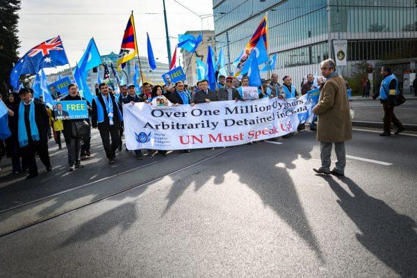 Uyghurs and Tibetan people demonstrate against China outside of the United Nations (UN) offices in Geneva on Nov. 6, 2018. (Fabrice Coffrini/AFP/Getty Images)