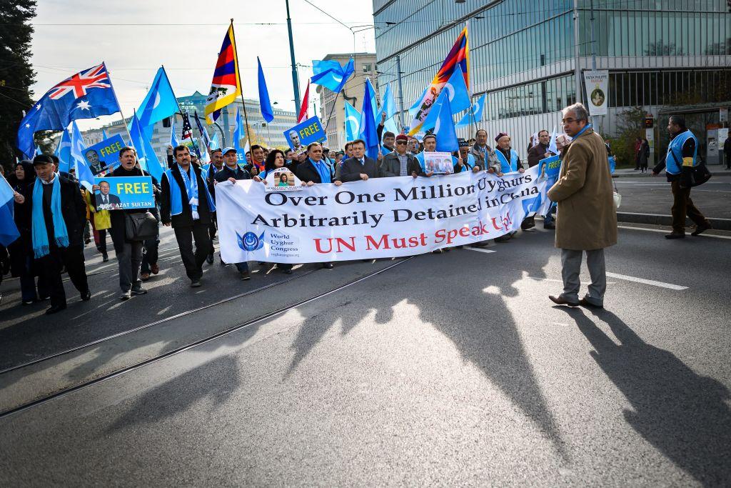 Uyghurs and Tibetan people demonstrate against China outside of the United Nations (UN) offices in Geneva during on Nov. 6, 2018. (Fabrice Coffrini/AFP/Getty Images)