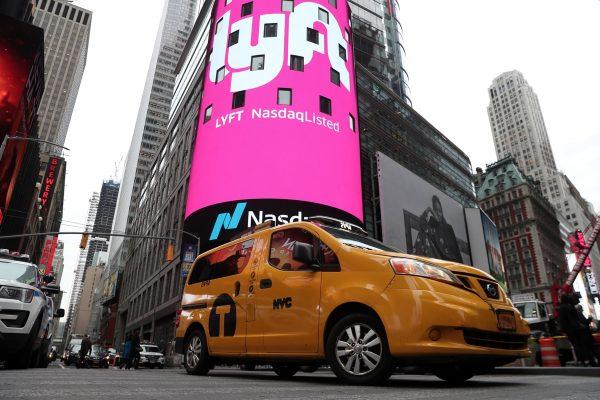 Signage for Lyft is seen displayed at the NASDAQ MarketSite in Times Square in celebration of its initial public offering (IPO) on the NASDAQ Stock Market in N.Y. on March 29, 2019. (Shannon Stapleton/Reuters)