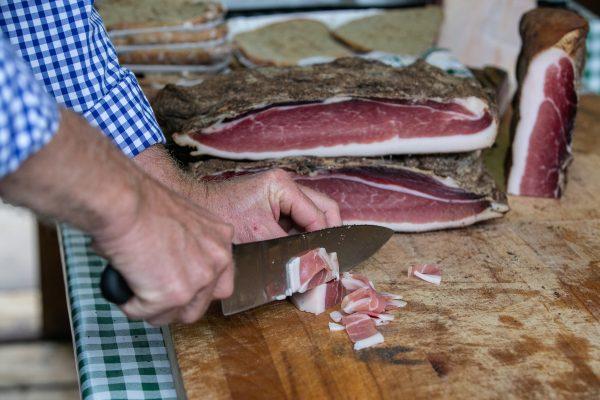 The traditional way to slice speck is by hand. (Marco Parisi)