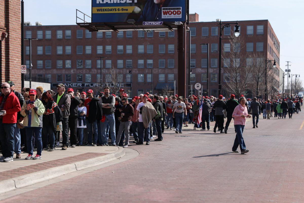 People wait in line before President Donald Trump’s MAGA rally in Grand Rapids, Mich., on March 28, 2019. (Charlotte Cuthbertson/The Epoch Times)