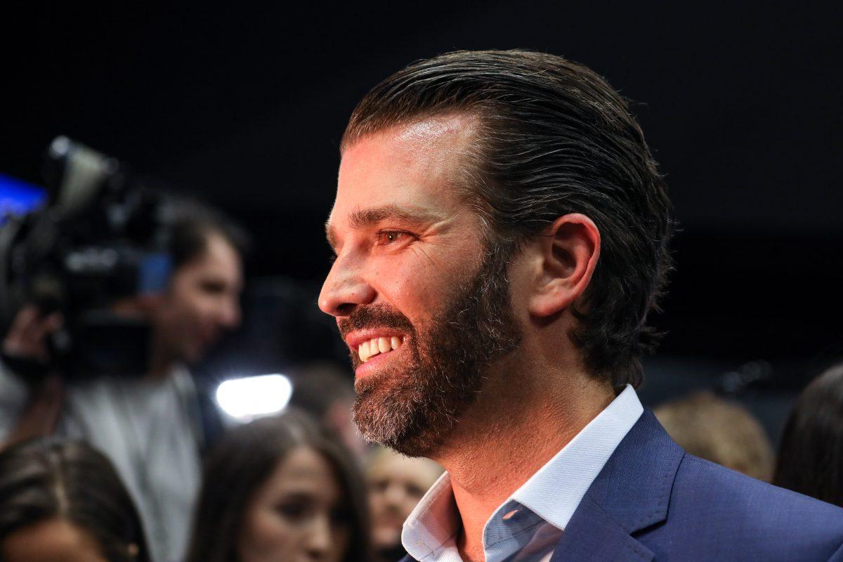 Donald Trump Jr., on the media riser before President Donald Trump’s MAGA rally in Grand Rapids, Mich., on March 28, 2019. (Charlotte Cuthbertson/The Epoch Times)