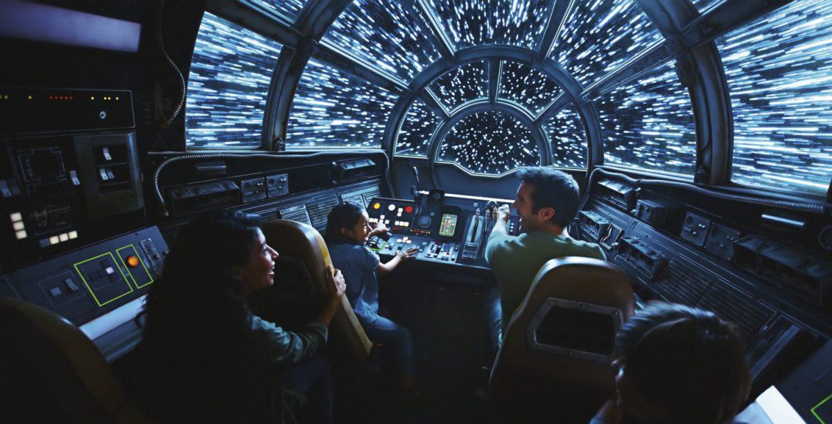 This rendering released by Disney and Lucasfilm shows people on the planned Inside Millennium Falcon: Smugglers Run attraction, part of Star Wars: Galaxy’s Edge a 14-acre area set to open this summer at the Disneyland Resort in Anaheim, California, then in the fall at Disney’s Hollywood Studios in Orlando, Florida. (Disney Parks/Lucasfilm via AP)