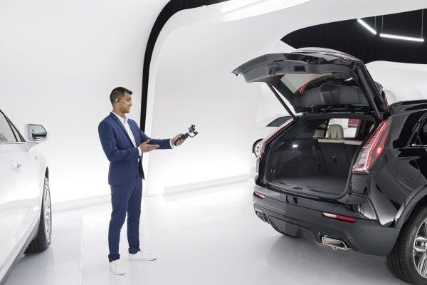 A Cadillac Live Agent demonstrating the trunk space in the 2019 Cadillac XT4.<br/>(Cadillac Canada)