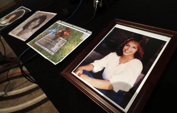 Photos of Lorraine "Lorry" Ann Borowski are displayed on a table at a news conference in Rosemont, Ill., on March 29, 2019. (Nam Y. Huh via AP)