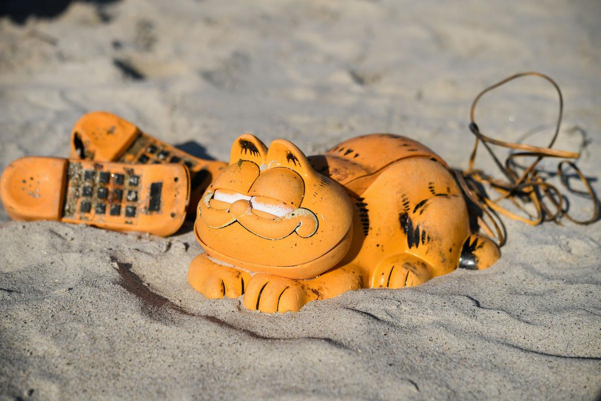 The Mystery of Garfield Phones Washing Up on Beaches Finally Solved