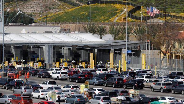 Cars queue up in multiple lines as they wait to be inspected by U.S. border patrol officers to enter from Mexico into the U.S., at the San Ysidro point of entry, in Tijuana, Mexico, on March 29, 2019. (Jorge Duenes/Reuters)