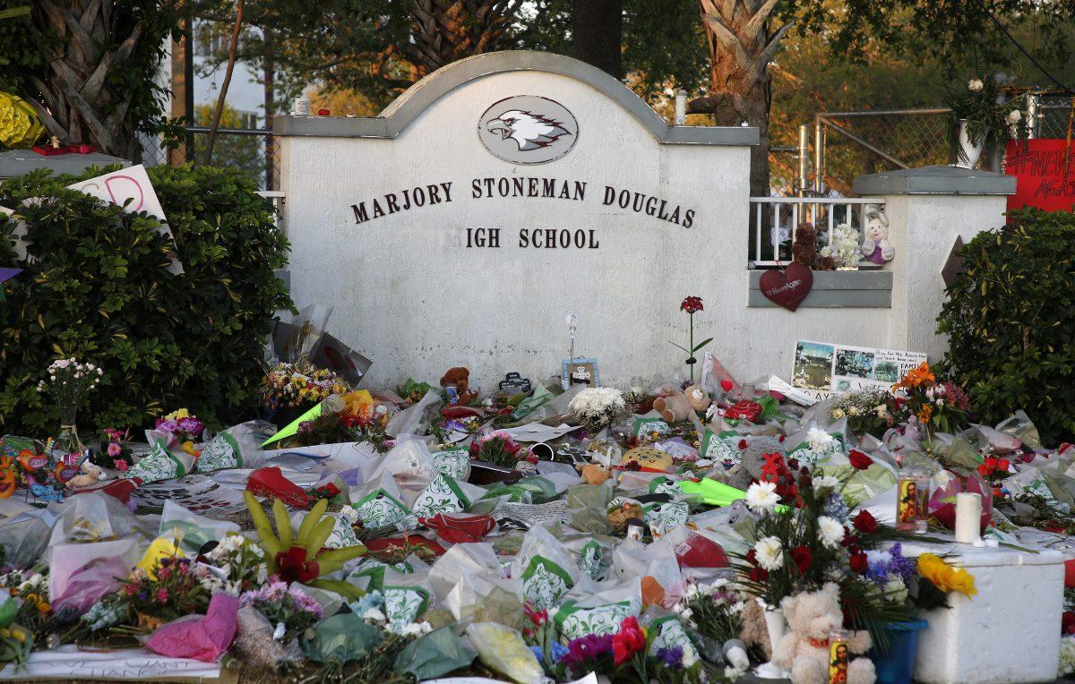 Flowers, candles, and mementos sit outside one of the makeshift memorials in Parkland, Fla., on Feb. 27, 2018. (Rhona Wise/AFP/Getty Images)