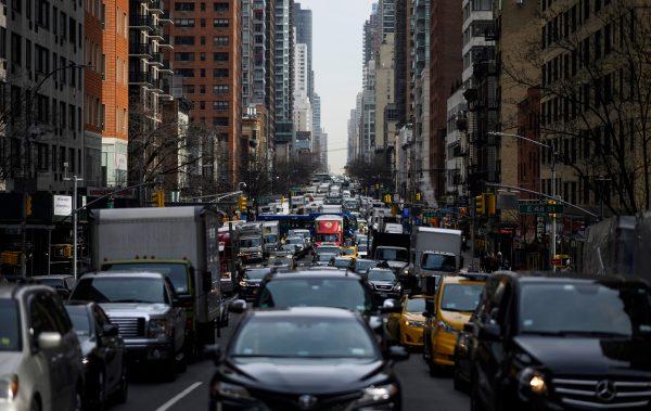 Traffic moves on 2nd Avenue in the morning hours on March 15, 2019, in New York City. (Johannes Eisele/AFP/Getty Images)