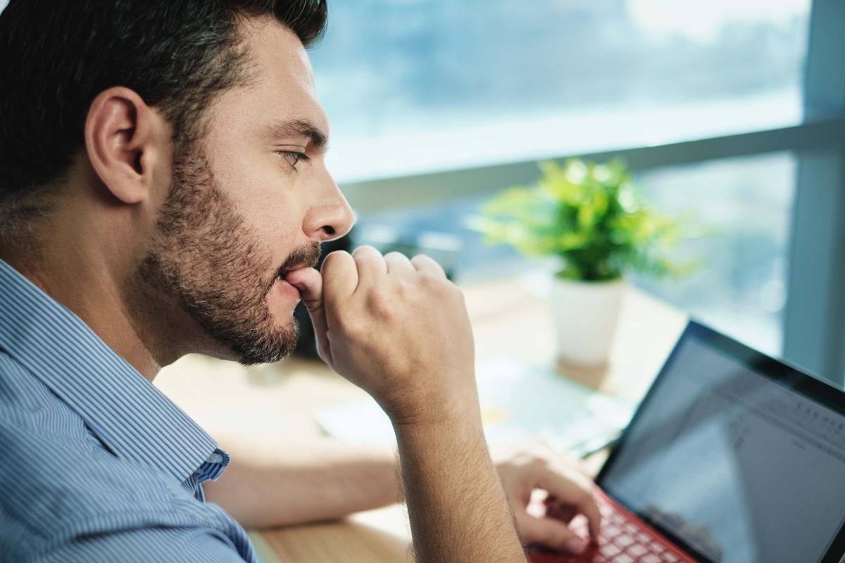 Illustration - Shutterstock | <a href="https://www.shutterstock.com/image-photo/impatient-businessman-working-laptop-computer-office-1307748157">Diego Cervo</a>