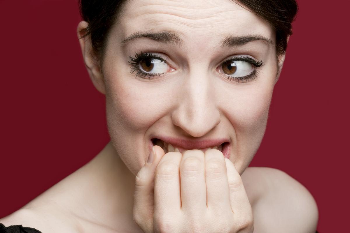 Illustration - Shutterstock | <a href="https://www.shutterstock.com/image-photo/nervous-girl-biting-her-finger-nails-53624944">Isabell Schatz </a>