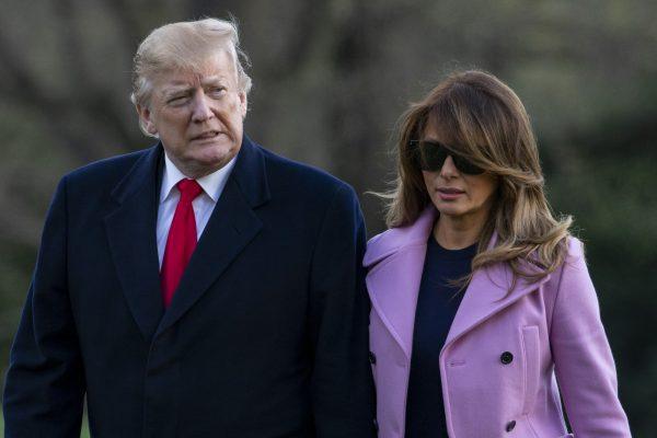 President Donald Trump and first lady Melania Trump walk off Marine One on the South Lawn of the White House in Washington on March 31, 2019. (Tasos Katopodis-Pool/Getty Images)