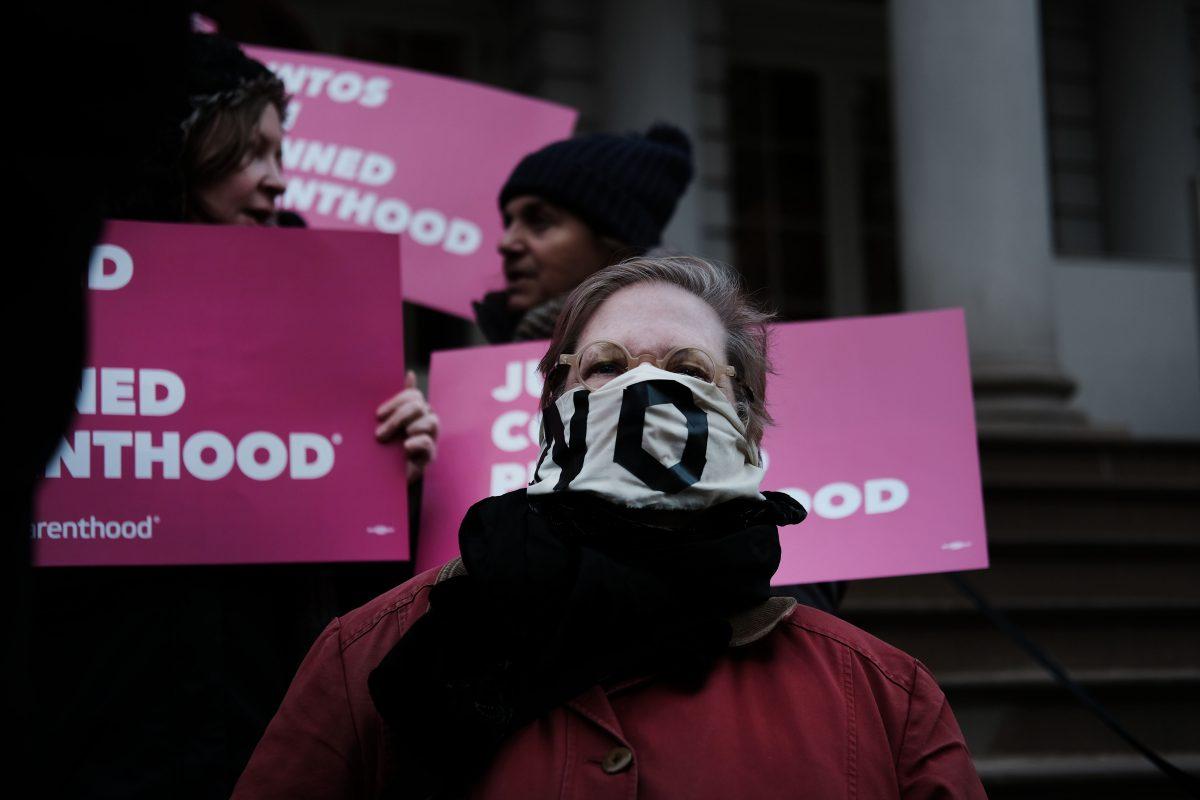 Pro-choice activists, politicians and others associated with Planned Parenthood gather for a news conference and demonstration at City Hall against the Trump administrations title X rule change in New York City on Feb. 25, 2019. (Spencer Platt/Getty Images)