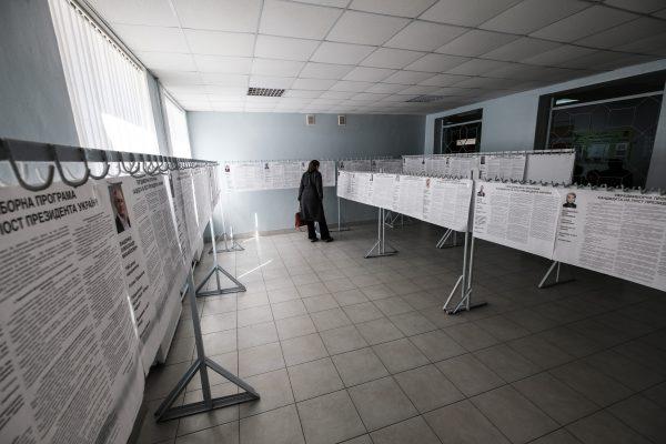A whopping 39 candidates ran in the first round of Ukraine’s presidential election. Candidate profiles took up an entire room at a polling station in Kharkiv on March 31, 2019. (Chris Collison for The Epoch Times)