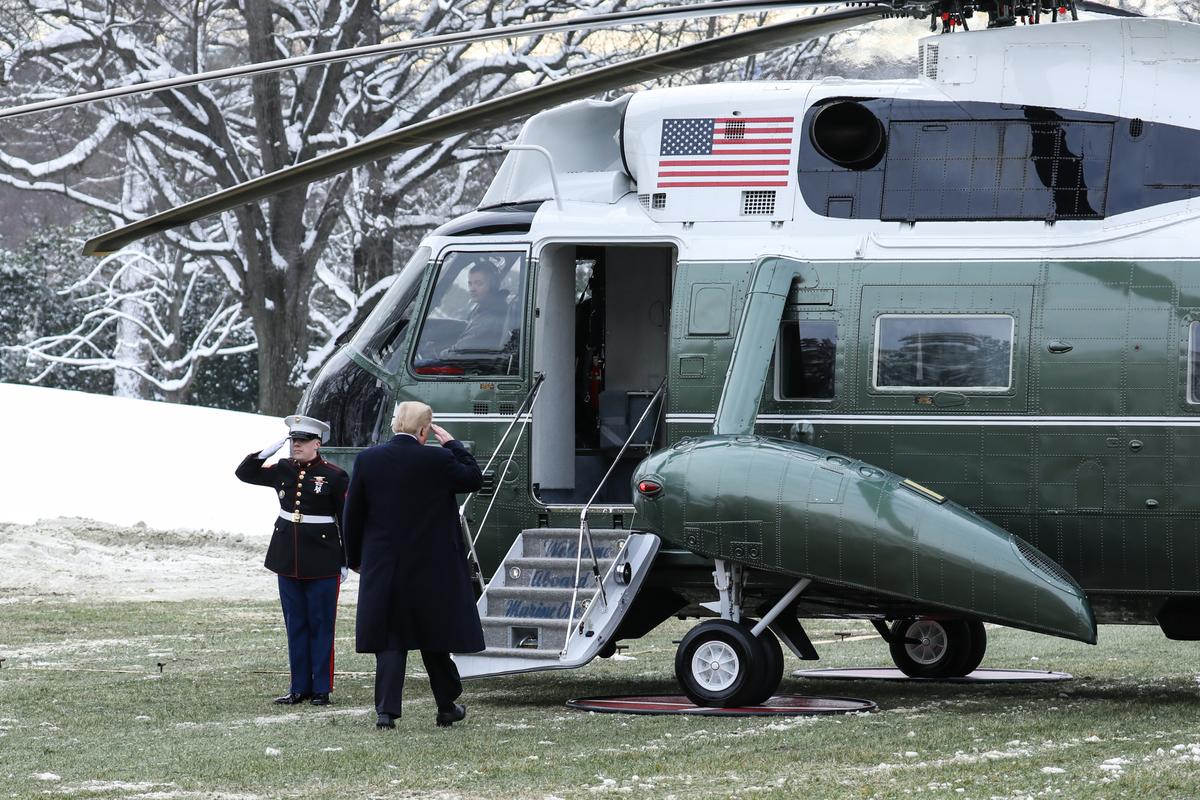 President Donald Trump walks to Marine One on the South Lawn of the White House in Washington en route to New Orleans, La., on Jan. 14, 2019. (Holly Kellum/NTD)